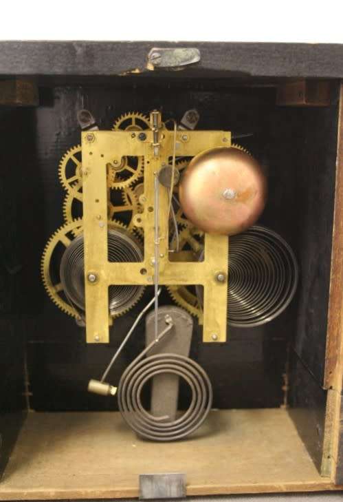 A beautiful, stylish vintage black wood "Sessions" wind up pendulum mantle clock. Working.