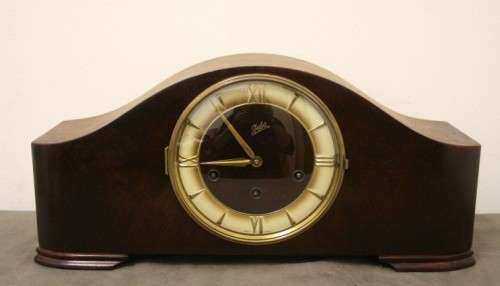 A gorgeous German made Art deco style "Juba" wind up chiming mantle clock in working condition.