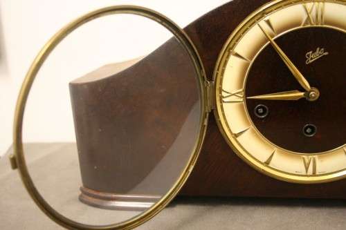 A gorgeous German made Art deco style "Juba" wind up chiming mantle clock in working condition.