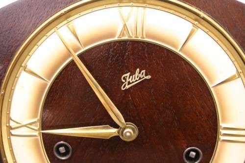 A gorgeous German made Art deco style "Juba" wind up chiming mantle clock in working condition.
