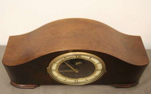 A gorgeous German made Art deco style "Juba" wind up chiming mantle clock in working condition.