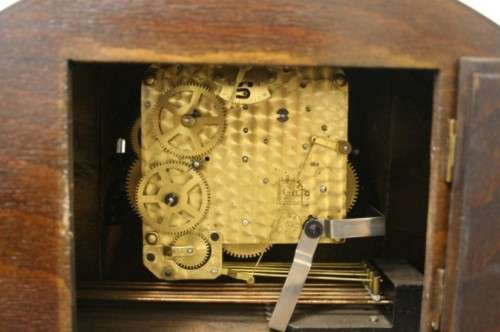 A gorgeous German made Art deco style "Juba" wind up chiming mantle clock in working condition.