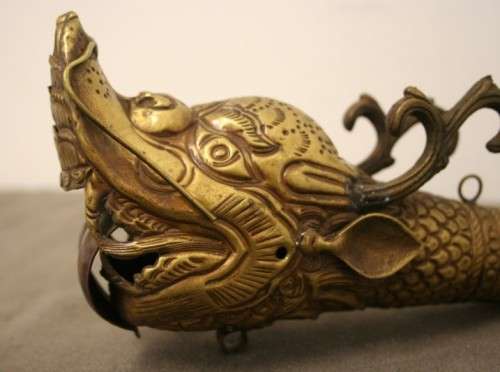 An amazing antique Buddhist Tibetan Dbang Dang dragon head ceremonial prayer horn.