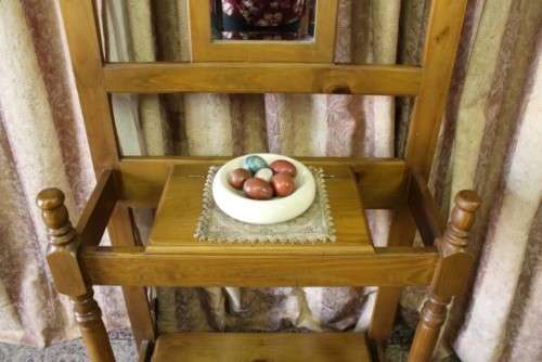 A gorgeous light wood hall stand with a coloured stained glass top, centre mirror and storage drawer
