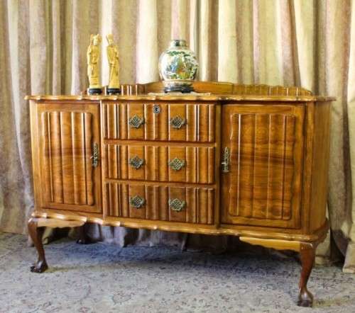 A fabulous vintage ball & claw buffet/ side server with beautiful styled doors and three drawers