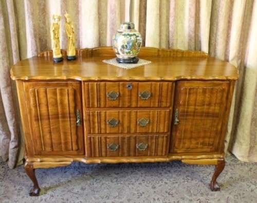 A fabulous vintage ball & claw buffet/ side server with beautiful styled doors and three drawers