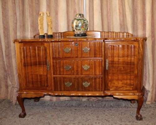 A fabulous vintage ball & claw buffet/ side server with beautiful styled doors and three drawers
