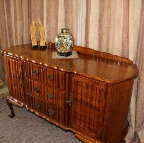 A fabulous vintage ball & claw buffet/ side server with beautiful styled doors and three drawers