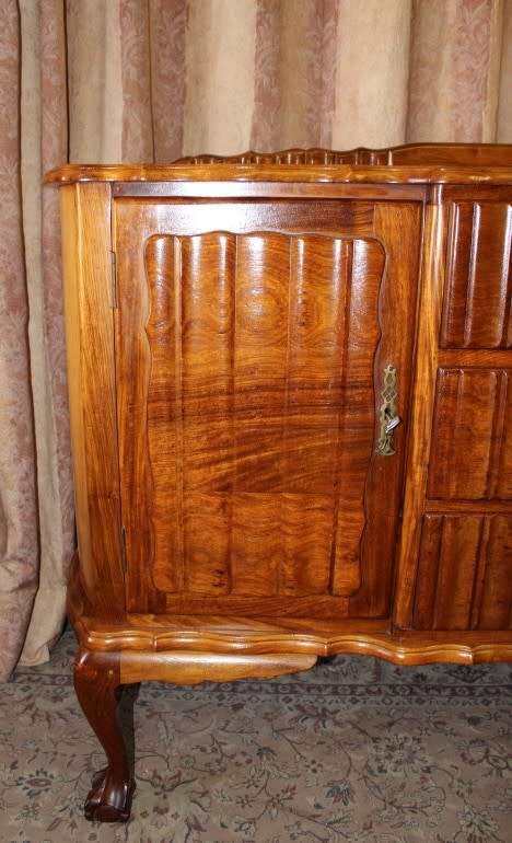 A fabulous vintage ball & claw buffet/ side server with beautiful styled doors and three drawers