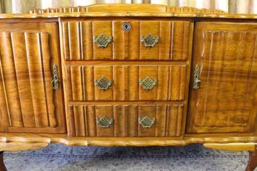 A fabulous vintage ball & claw buffet/ side server with beautiful styled doors and three drawers