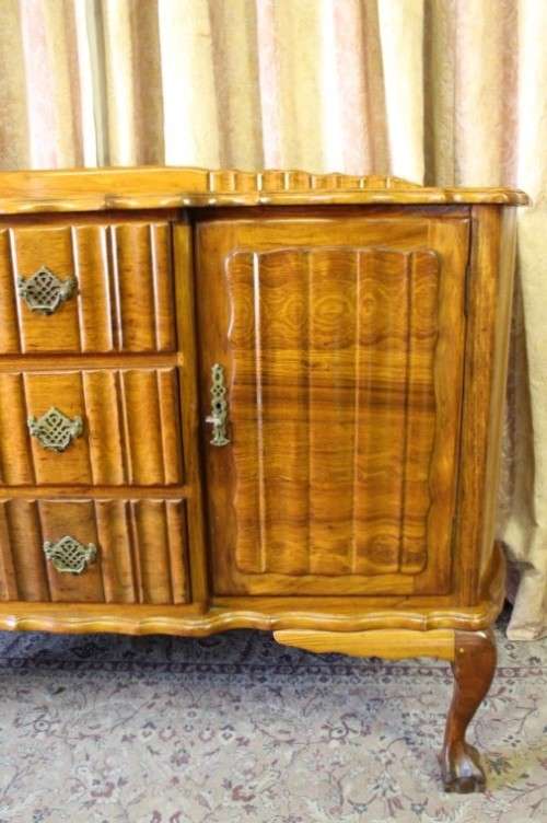 A fabulous vintage ball & claw buffet/ side server with beautiful styled doors and three drawers