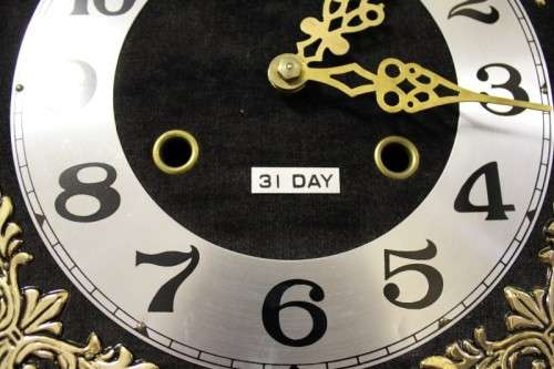 A beautiful, stylish vintage wall hanging "Blessings" 31 day wind up pendulum clock.