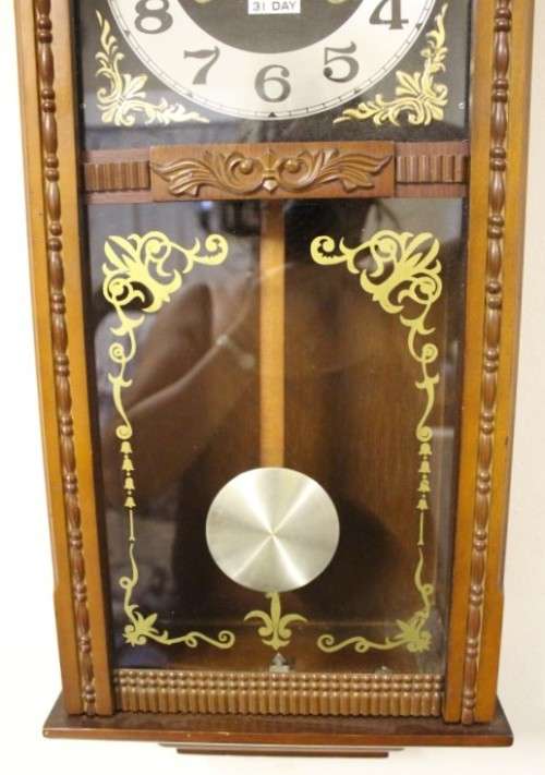 A beautiful, stylish vintage wall hanging "Blessings" 31 day wind up pendulum clock.