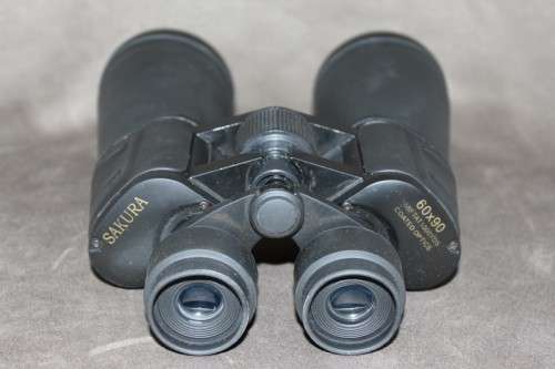 An awesome pair of Sakura 60 x 90 binoculars with coated optics in their original case.