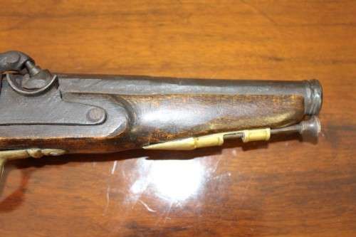 A fantastic wood with brass embellishments vintage powder pistol. Awesome display piece!!!