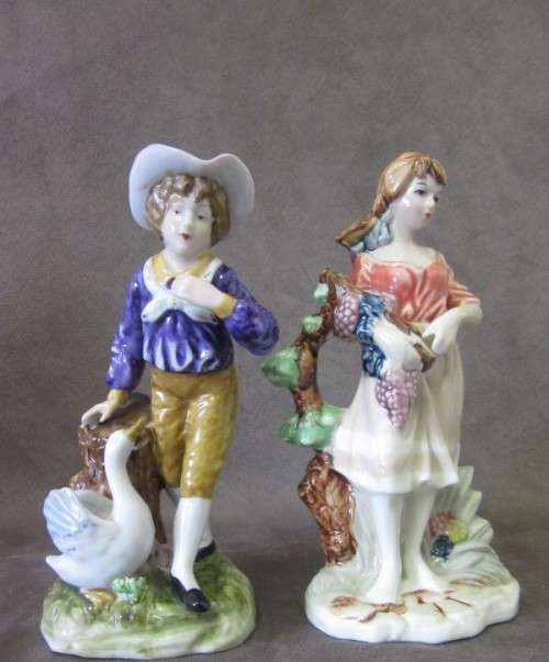 Two gorgeous Victorian themed porcelain figurines, fabulous on display. One price for both.