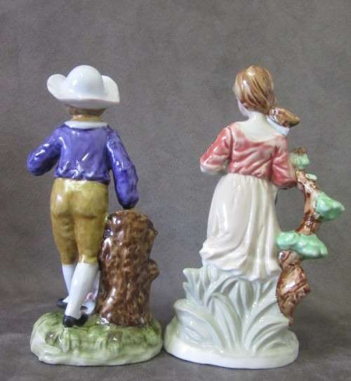 Two gorgeous Victorian themed porcelain figurines, fabulous on display. One price for both.