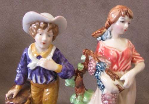 Two gorgeous Victorian themed porcelain figurines, fabulous on display. One price for both.