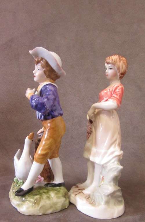 Two gorgeous Victorian themed porcelain figurines, fabulous on display. One price for both.