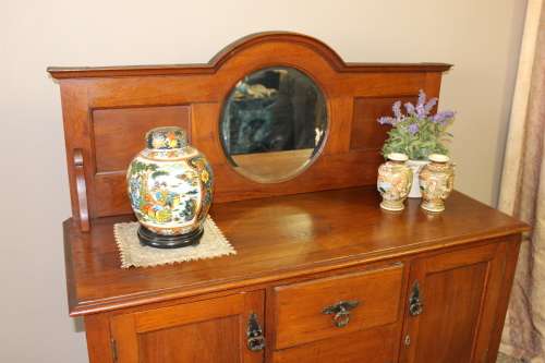 A stunning antique oak side server cabinet with a bevelled mirror, loads of drawer & cupboard space