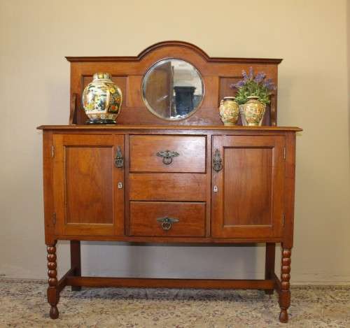 A stunning antique oak side server cabinet with a bevelled mirror, loads of drawer & cupboard space