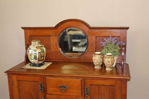 A stunning antique oak side server cabinet with a bevelled mirror, loads of drawer & cupboard space