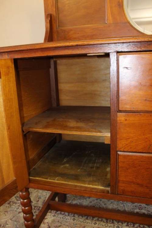 A stunning antique oak side server cabinet with a bevelled mirror, loads of drawer & cupboard space