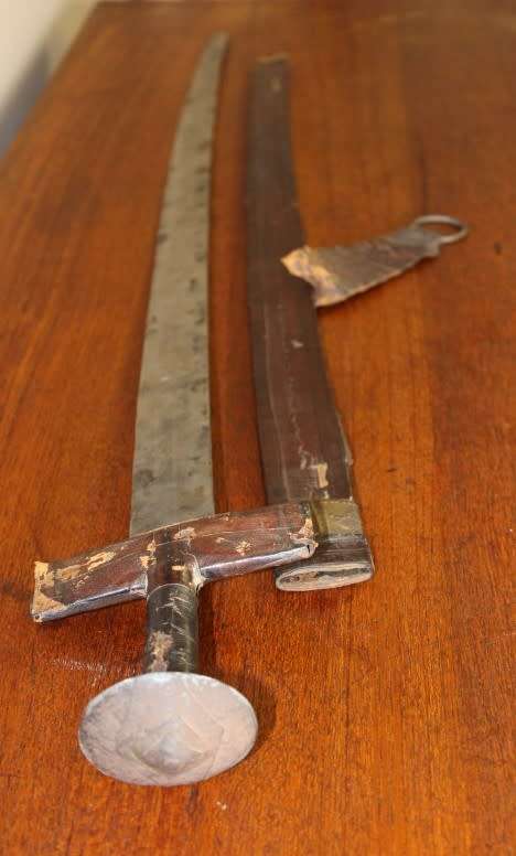 An incredible rare antique Takoba sword in its original leather sheath. Fantastic on display!!