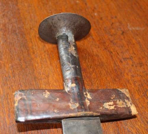 An incredible rare antique Takoba sword in its original leather sheath. Fantastic on display!!