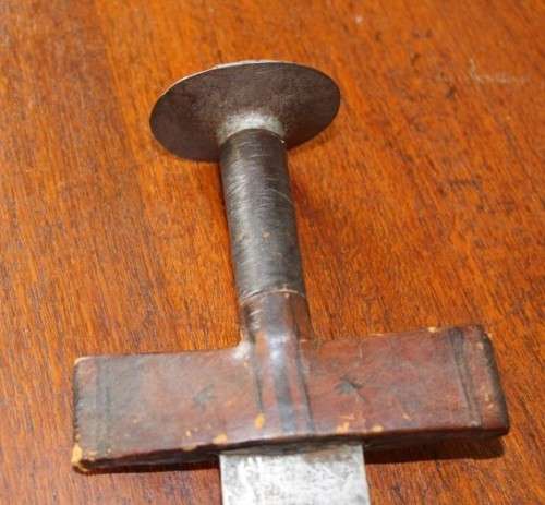 An incredible rare antique Takoba sword in its original leather sheath. Fantastic on display!!