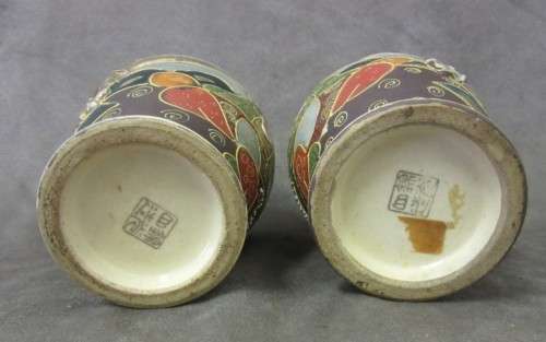 An incredible pair of Japanese Satsuma "Moriage Dragonware" porcelain vases with raised dragons