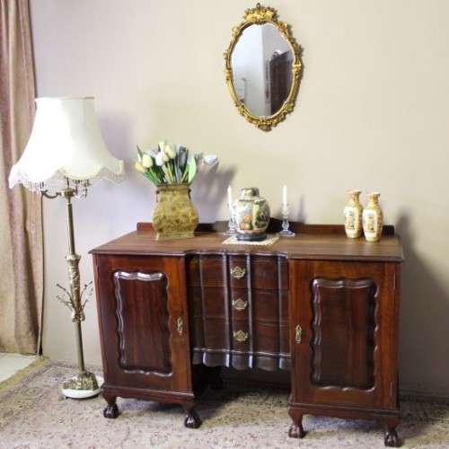 A fantastic vintage Imbuia ball & claw buffet/ side server w/ beautiful styled doors & three drawers
