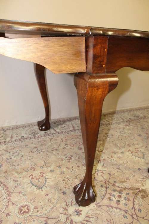 A fabulous stylish vintage drop leaf occasional table with oversized ball and claw feet. Stunning!!!