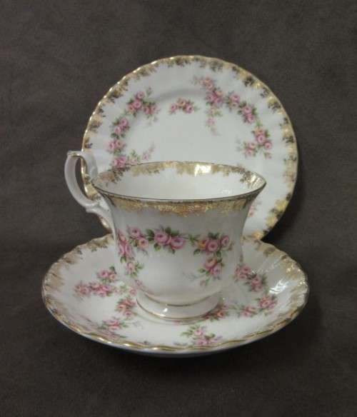 A beautiful, elegant vintage "Royal Albert" fine bone china "Dimity Roses" pattern trio. Price/trio