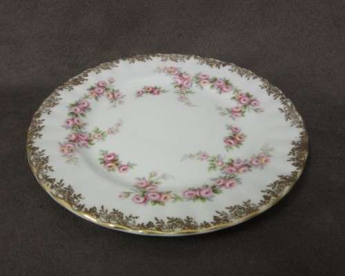 A beautiful, elegant vintage "Royal Albert" fine bone china "Dimity Roses" pattern trio. Price/trio