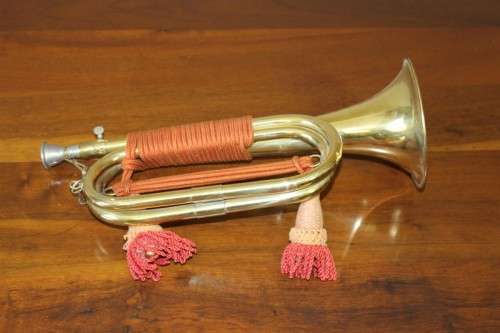 A fantastic ornate vintage brass military bugle with orange rope & tassel. Lifespace Sale