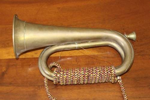 A fabulous vintage brass military bugle with colourful rope & tassel.  Lifespace Sale