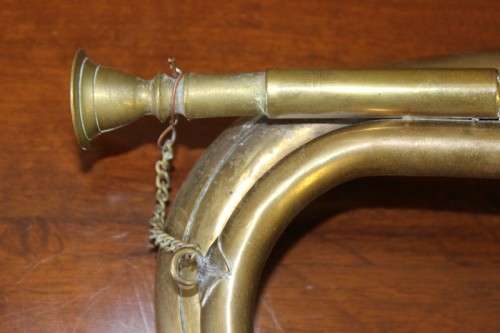 A fabulous vintage brass military bugle with colourful rope & tassel.  Lifespace Sale