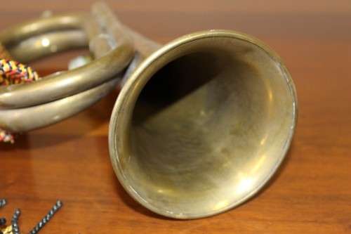 A fabulous vintage brass military bugle with colourful rope & tassel.  Lifespace Sale
