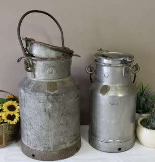 A pair of vintage metal cream/ milk canisters (2 gallon/5ltr) with loads of charm & character.