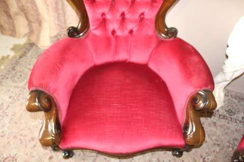 An elegant pair of antique Victorian styled arm chairs w/ button detailing & gorgeous fabric.