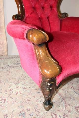 An elegant pair of antique Victorian styled arm chairs w/ button detailing & gorgeous fabric.
