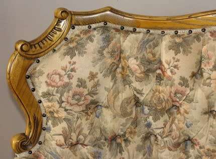 An exquisite Victorian 2 seater couch w carved detailing & period style floral upholstery. Beautiful