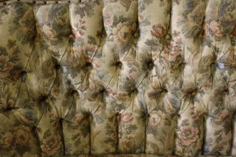 An exquisite Victorian 2 seater couch w carved detailing & period style floral upholstery. Beautiful