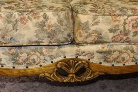 An exquisite Victorian 2 seater couch w carved detailing & period style floral upholstery. Beautiful