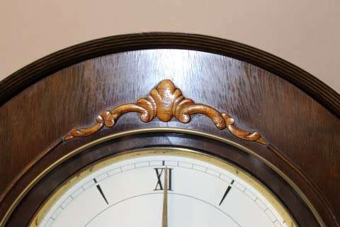 An exquisite Art Deco 1950's German made Junghans weight driven "Granddaughter" clock w/ enamel face