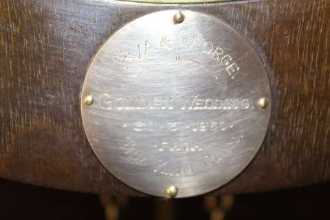 An exquisite Art Deco 1950's German made Junghans weight driven "Granddaughter" clock w/ enamel face