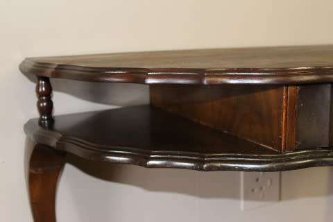A beautiful vintage Imbuia scalloped edge Ball & claw half moon display/occasional table w/ a drawer