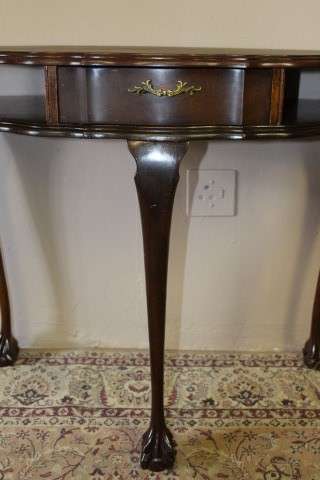 A beautiful vintage Imbuia scalloped edge Ball & claw half moon display/occasional table w/ a drawer