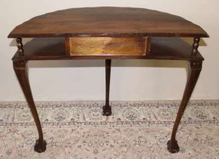A beautiful vintage Imbuia scalloped edge Ball & claw half moon display/occasional table w/ a drawer